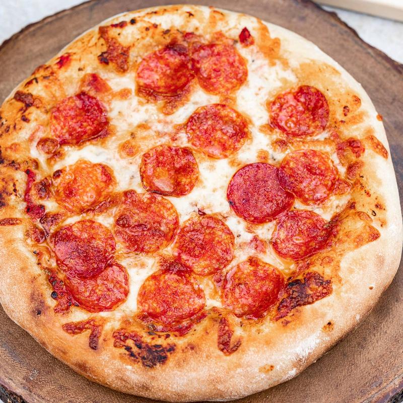 Idealne ciasto na pizzę: jak długo piec, aby uzyskać perfekcyjną chrupkość?